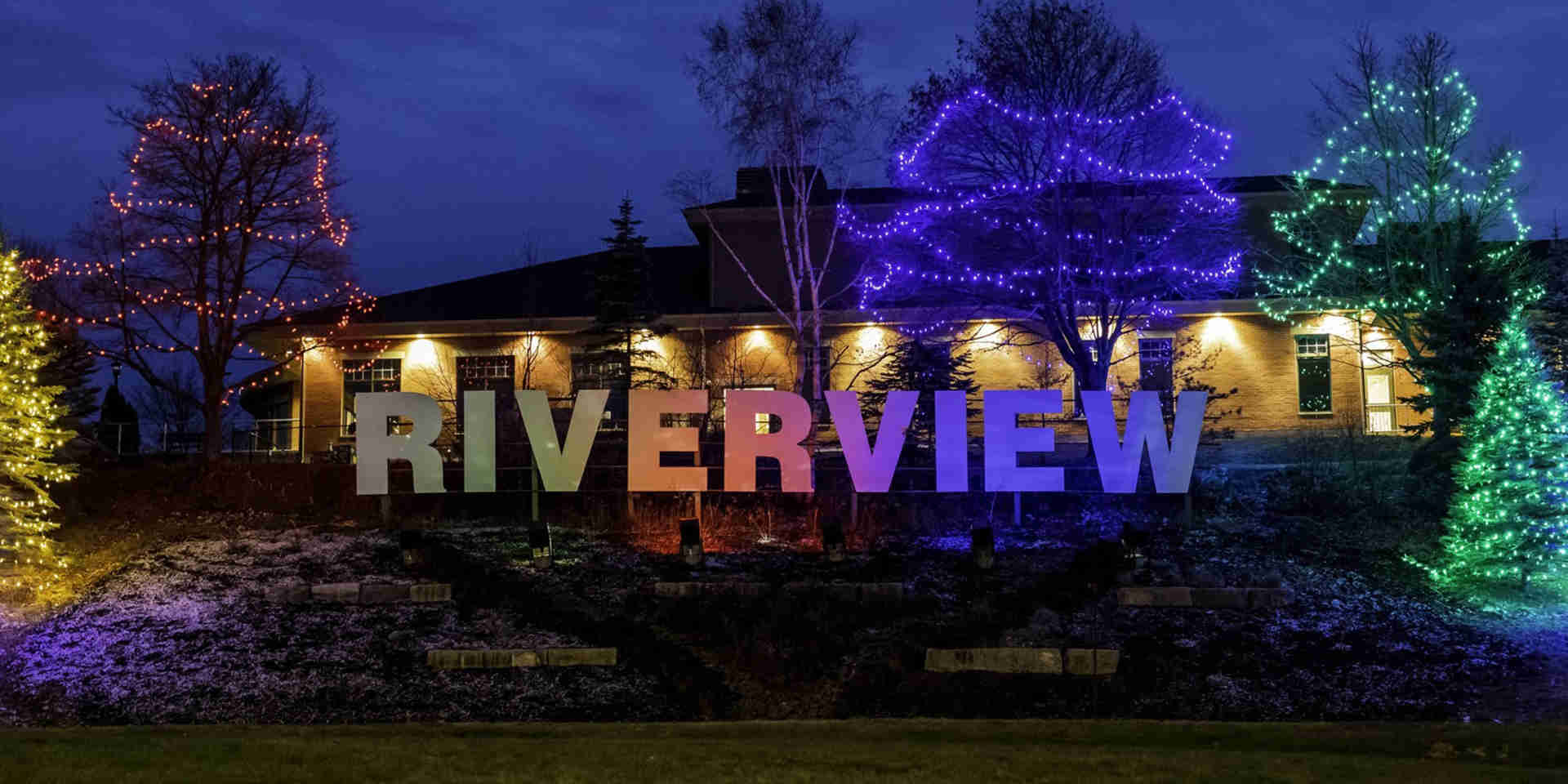 Should Retirees Rent Or Own? - Riverview-sign-lit-up